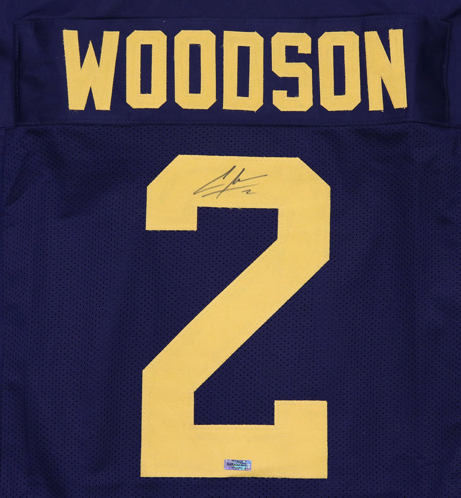 Charles Woodson Autographed Jersey